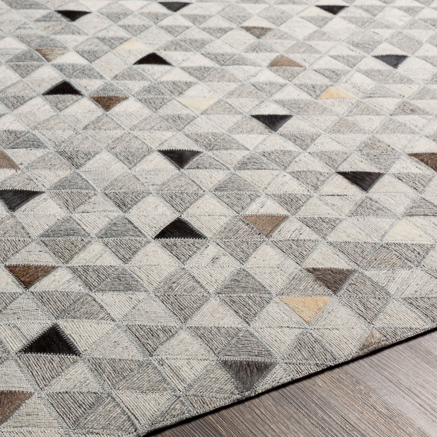 003 SI-1886223,SI-1886224,SI-1886226 | Closeup | Medora Rug - 30191 by Surya in gray, black, light gray, medium brown, light brown, tan. Made from 65% viscose, 35% leather in a unique style.