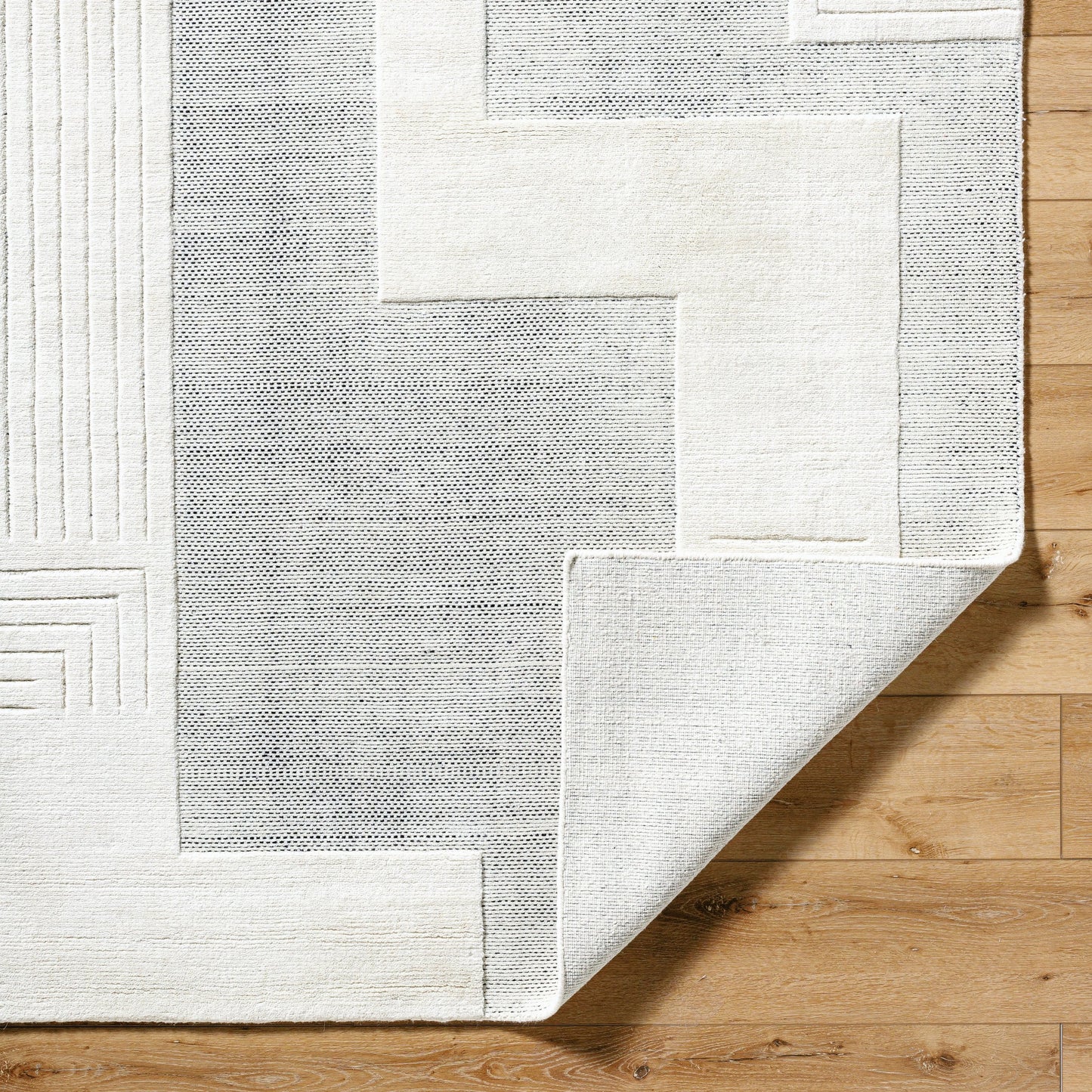 002 SI-2164766,SI-2164767,SI-2164768,SI-2164769 | Closeup | Molde Rug - 531206 by Surya in light silver, silver. Made from wool in a unique style.