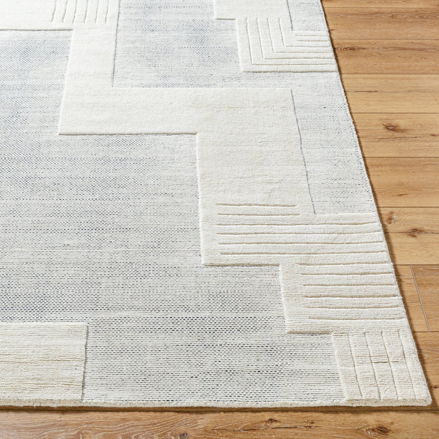 003 SI-2164766,SI-2164767,SI-2164768,SI-2164769 | Closeup | Molde Rug - 531206 by Surya in light silver, silver. Made from wool in a unique style.