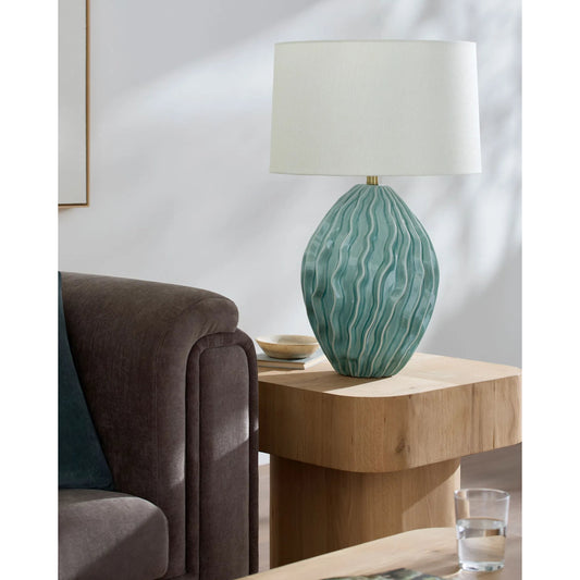 Marton Accent Table Lamp by Surya in translucent, cream, metallic gold, white, green. Made from ceramic, linen, polyester, iron in a modern style.