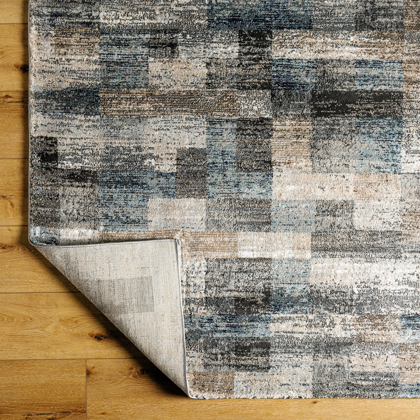 003 SI-2053058,SI-2053059,SI-2053060,SI-2053061 | Closeup | Montana Rug - 494870 by Livabliss in gray, tan, ivory, black, dark blue, pale blue. Made from face: 85% polypropylene, 15% polyester, warp: 100% jute in a unique style.