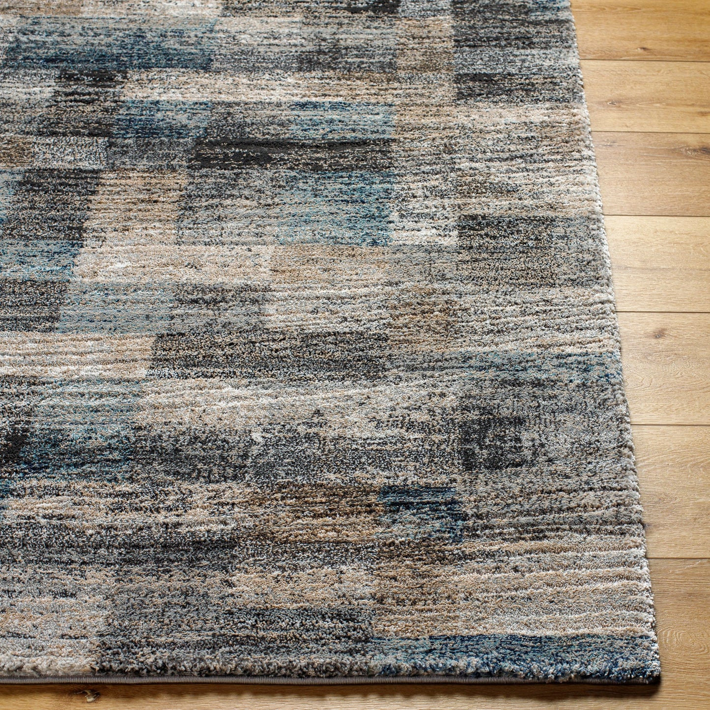 002 SI-2053058,SI-2053059,SI-2053060,SI-2053061 | Closeup | Montana Rug - 494870 by Livabliss in gray, tan, ivory, black, dark blue, pale blue. Made from face: 85% polypropylene, 15% polyester, warp: 100% jute in a unique style.