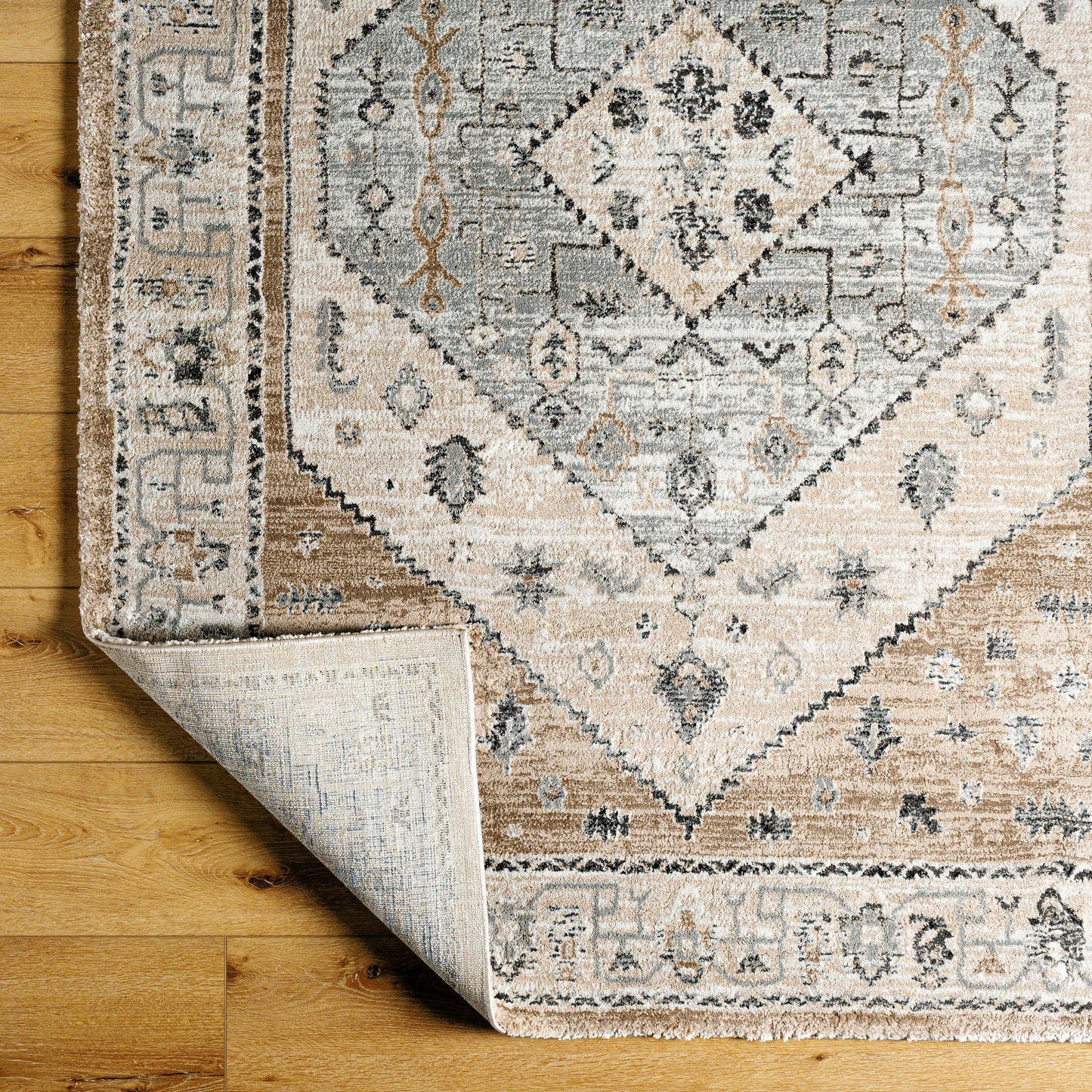 003 SI-2053062,SI-2053063,SI-2053064,SI-2053065 | Closeup | Montana Rug - 494877 by Livabliss in tan, ivory, gray, black. Made from face: 85% polypropylene, 15% polyester, warp: 100% jute in a unique style.
