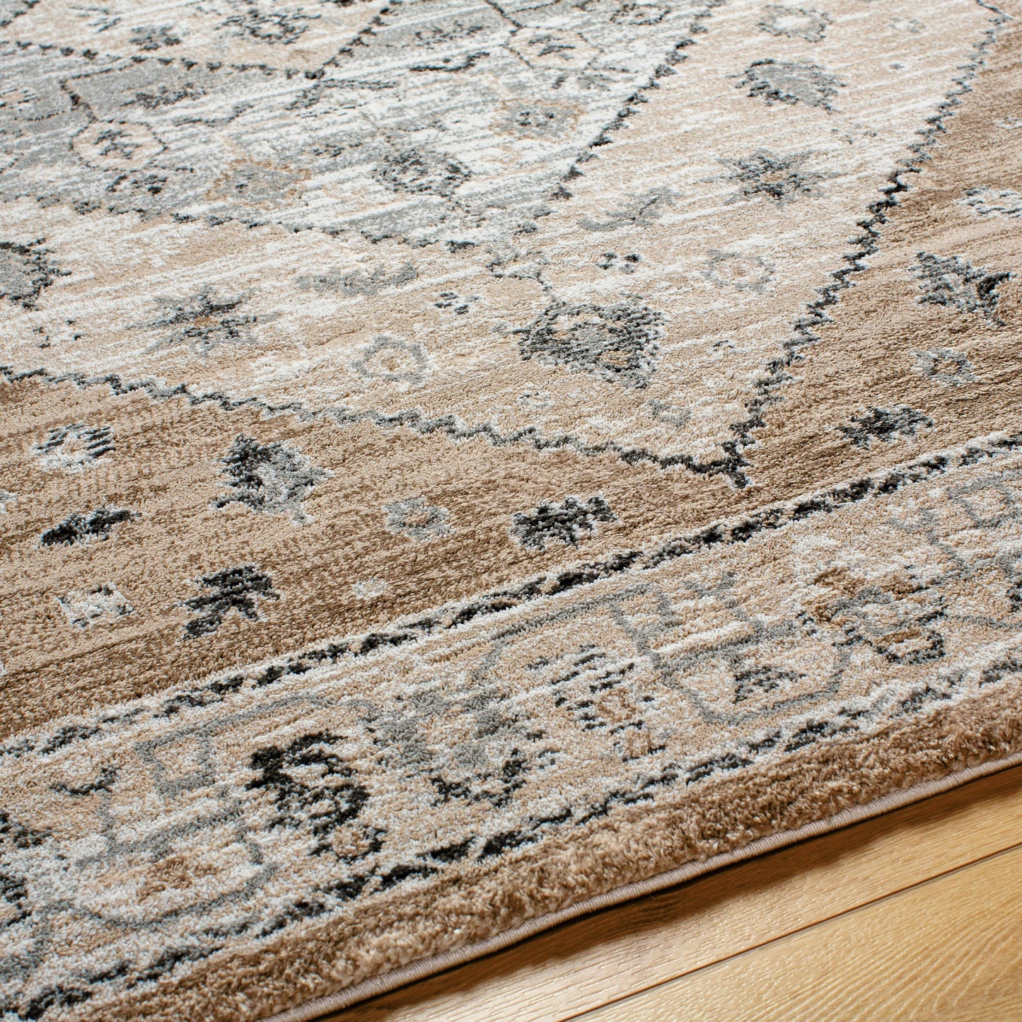 004 SI-2053062,SI-2053063,SI-2053064,SI-2053065 | Closeup | Montana Rug - 494877 by Livabliss in tan, ivory, gray, black. Made from face: 85% polypropylene, 15% polyester, warp: 100% jute in a unique style.