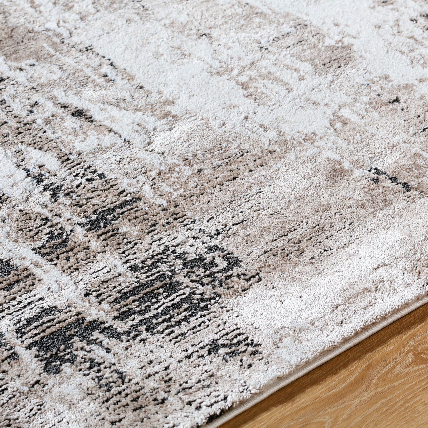 004 SI-2165621,SI-2165622,SI-2165623,SI-2165624 | Closeup | Montana Rug - 536266 by Livabliss in light beige, tan, ivory, black. Made from polypropylene, polyester in a unique style.