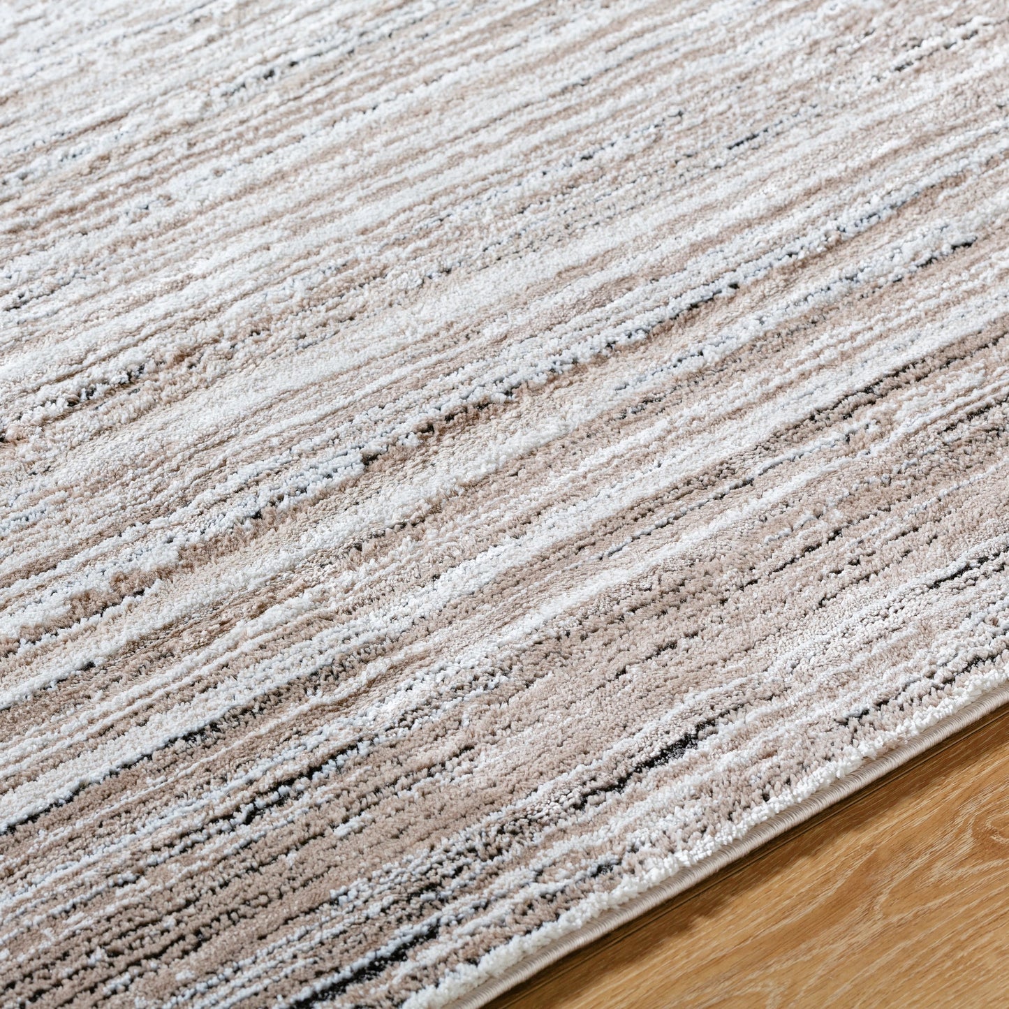 004 SI-2165629,SI-2165630,SI-2165631,SI-2165632 | Closeup | Montana Rug - 536280 by Livabliss in tan, ivory, light beige, black. Made from polypropylene, polyester in a unique style.