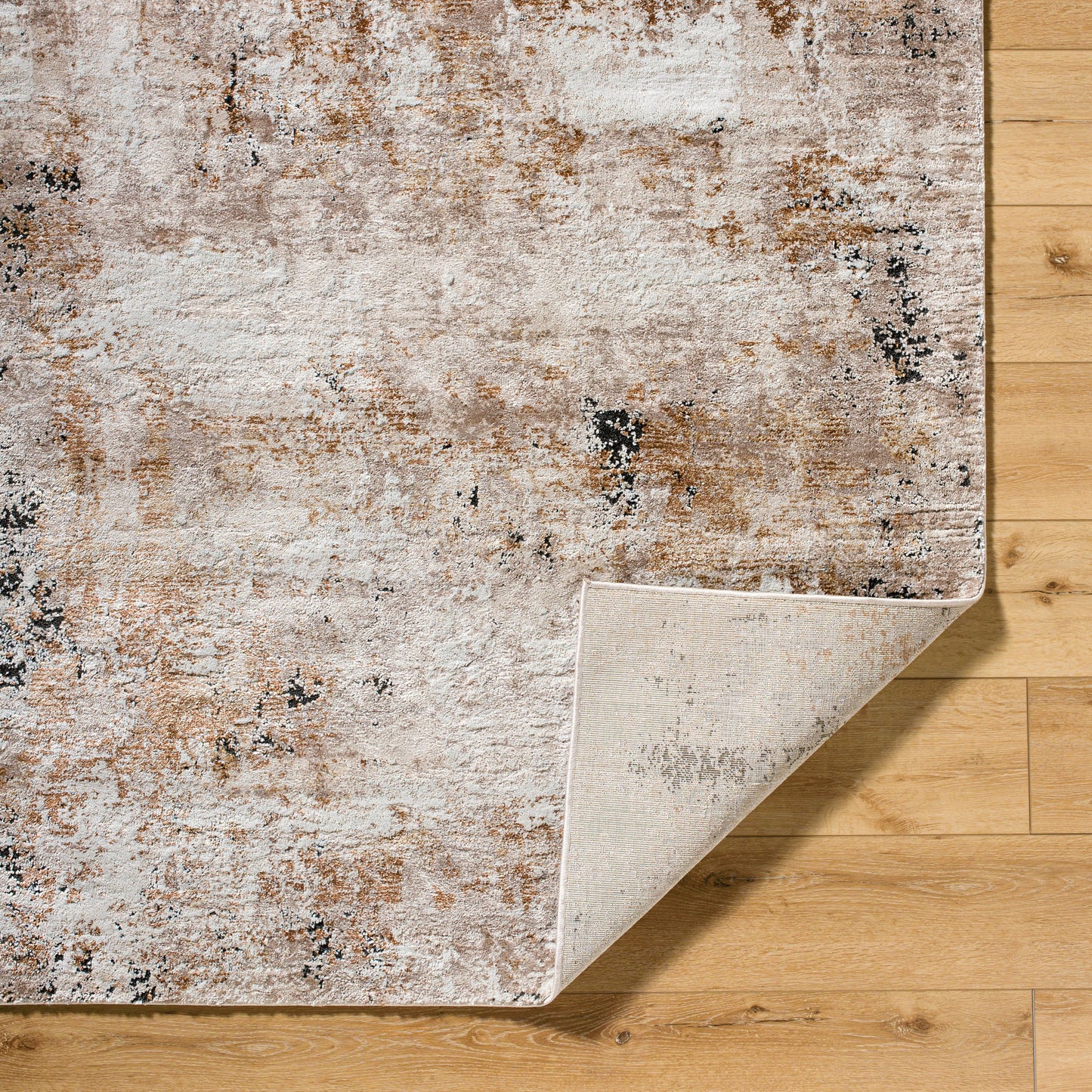 002 SI-2165633,SI-2165634,SI-2165635,SI-2165636 | Closeup | Montana Rug - 536293 by Livabliss in light beige, ivory, black, brown, tan. Made from polypropylene, polyester in a unique style.