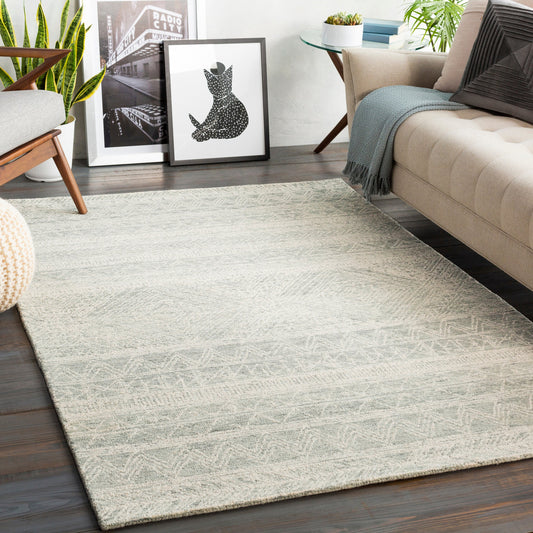Newcastle Rug - 23670 by Livabliss in seafoam, sage, cream. Made from 100% wool in a unique style.