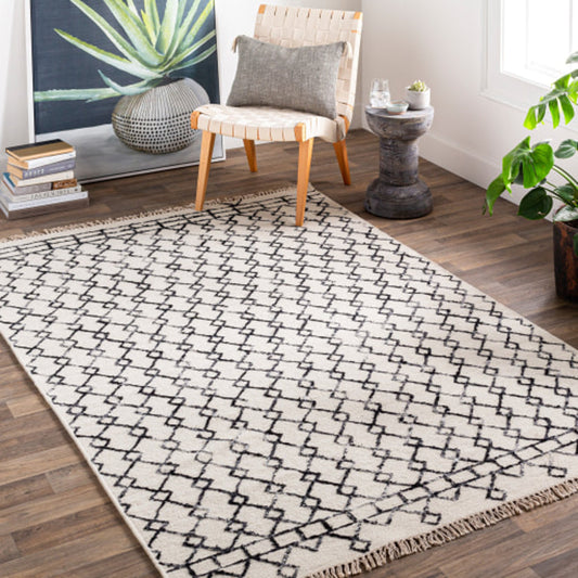 Nettie NET-1000 Rug by Surya in cream, black. Made from 70% wool, 30% cotton in a unique style.