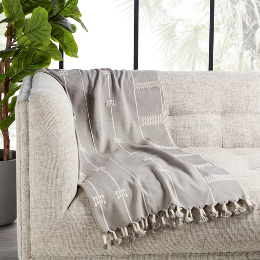 Nagaland Throw NGD10 Throw by Jaipur Living in light gray, cream. Made from 100% cotton in a cottage & farmhouse style.