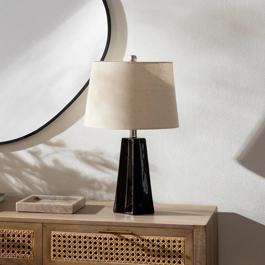 Stellan Table Lamp - 31886 by Livabliss in glazedpolished. Made from shade (outside): linen, shade (inside): polyester, body: ceramic, finial: metal, harp: metal in a modern style.