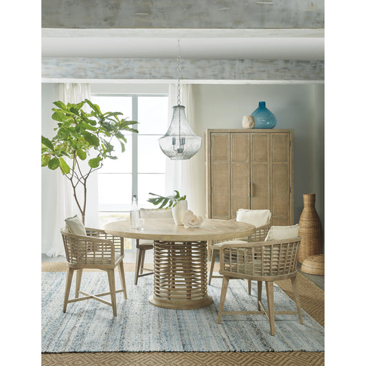 Surfrider Rattan Dining Table by Hooker Furniture in driftwood. Made from resin, rope, pecan veneers with solid-wood edge top in a coastal style.