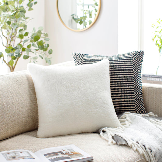 Northland Pillow - 22195 by Surya in cream. Made from front: 100% leather, back: 100% cotton in a modern style.