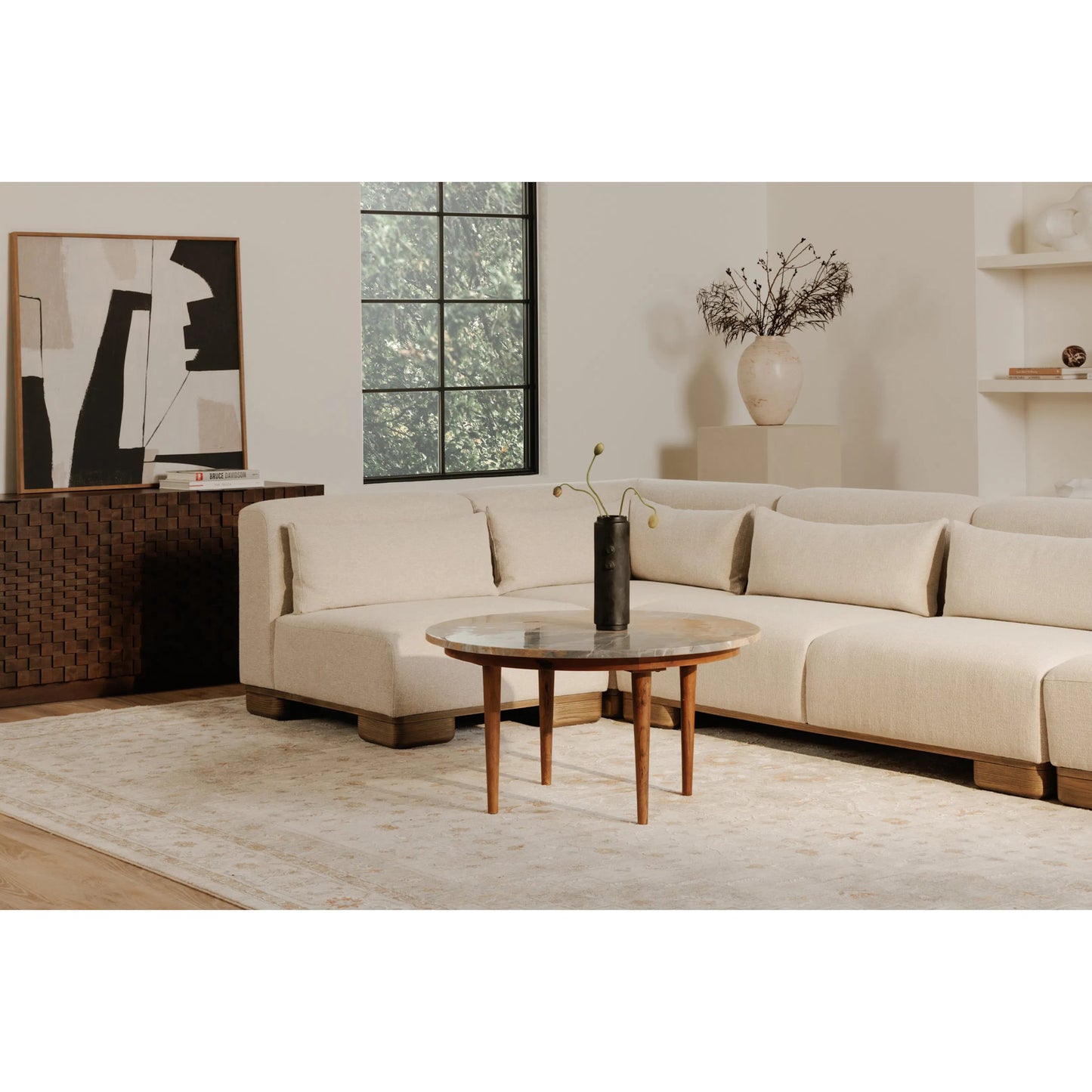 008 SI-2368117 | Lifestyle | June Corner Chair by Moe's Home Collection in oatmeal. Made from upholstery: 72% polyester, 28% acrylic, oak veneer base, foam, feather, fiber fill, solid wood, plywood frame in a transitional style.