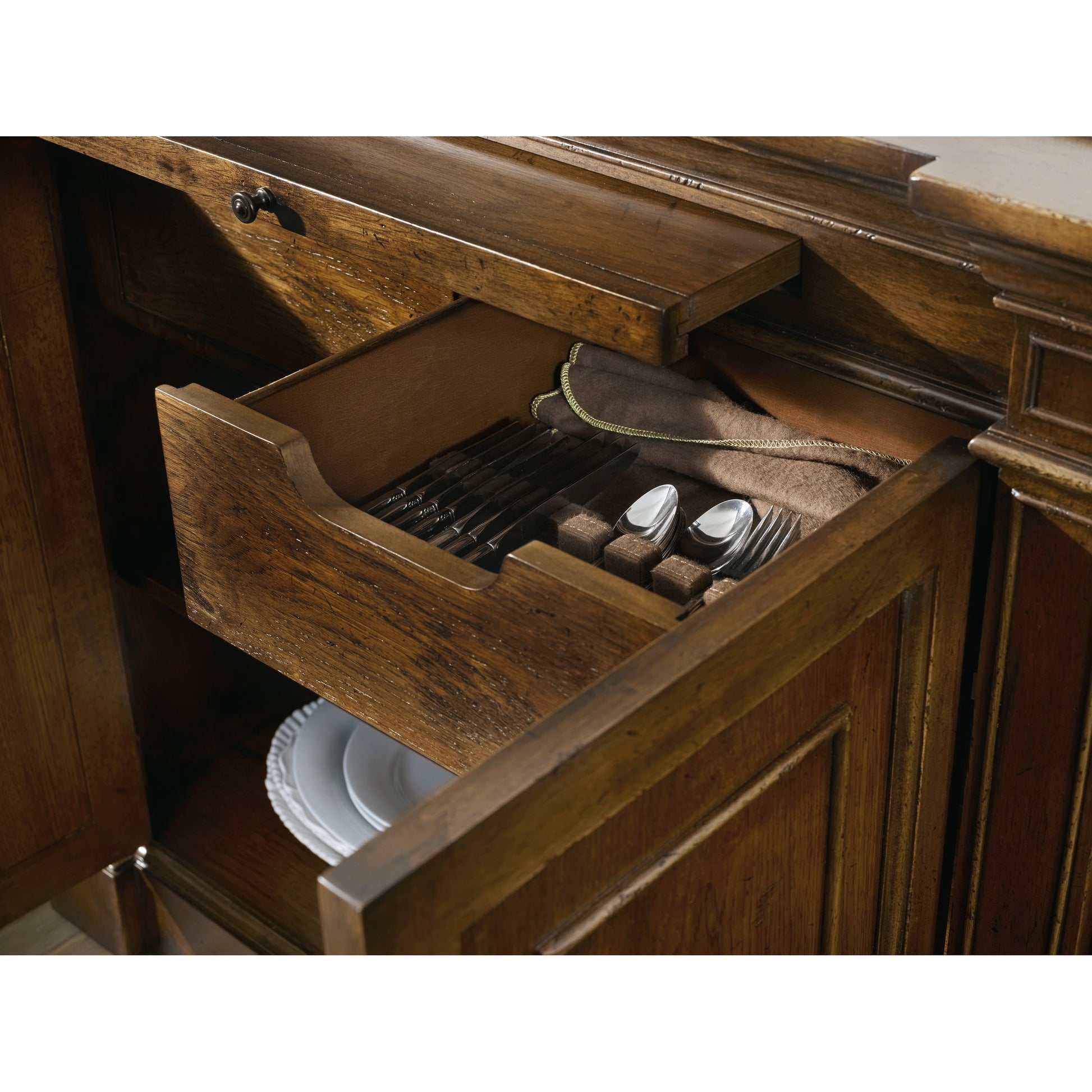 Archivist Sideboard by Hooker Furniture in pecan. Made from pecky pecan veneers, blue stone in a traditional style.