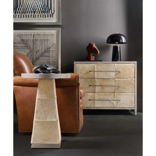 Melange Holy Cow Spot Table by Hooker Furniture in silver metal, beige leather. Made from wood, stone, metal, hair on hide leather, fabric, 82% polyester, 13% acrylic, 5% linen in a transitional style.
