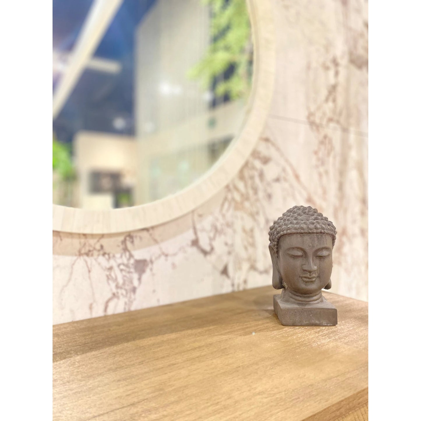 010 SI-2004363 | Lifestyle | Patio Buddha Head by LH Imports in light grey. Made from ficonstone ash grey in a modern style.