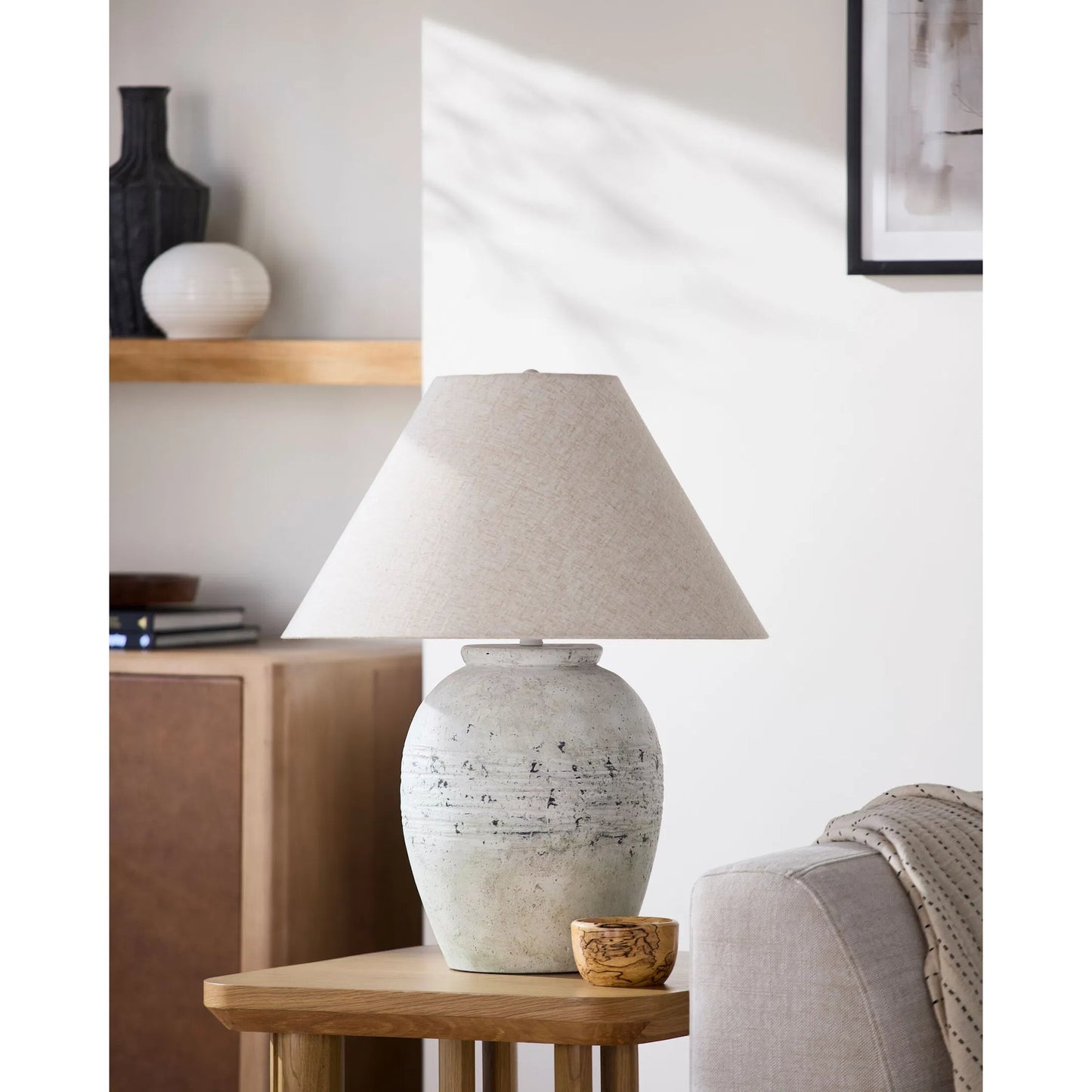 002 SI-2459474 | Lifestyle | Padula Accent Table Lamp by Surya in wheat, translucent, white, metallic gold, metallic brass. Made from cement, linen, plastic, iron in a transitional style.
