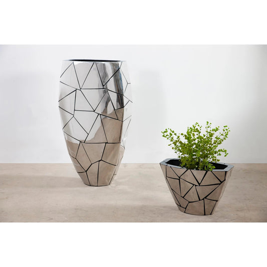 Triangle Crazy Cut Planter by Phillips Collection in silver and stainless steel. Made from resin metal, stainless steel in a modern style.