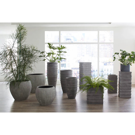 Brianna String Planter by Phillips Collection in gray and raw gray. Made from resin composite in a transitional style.
