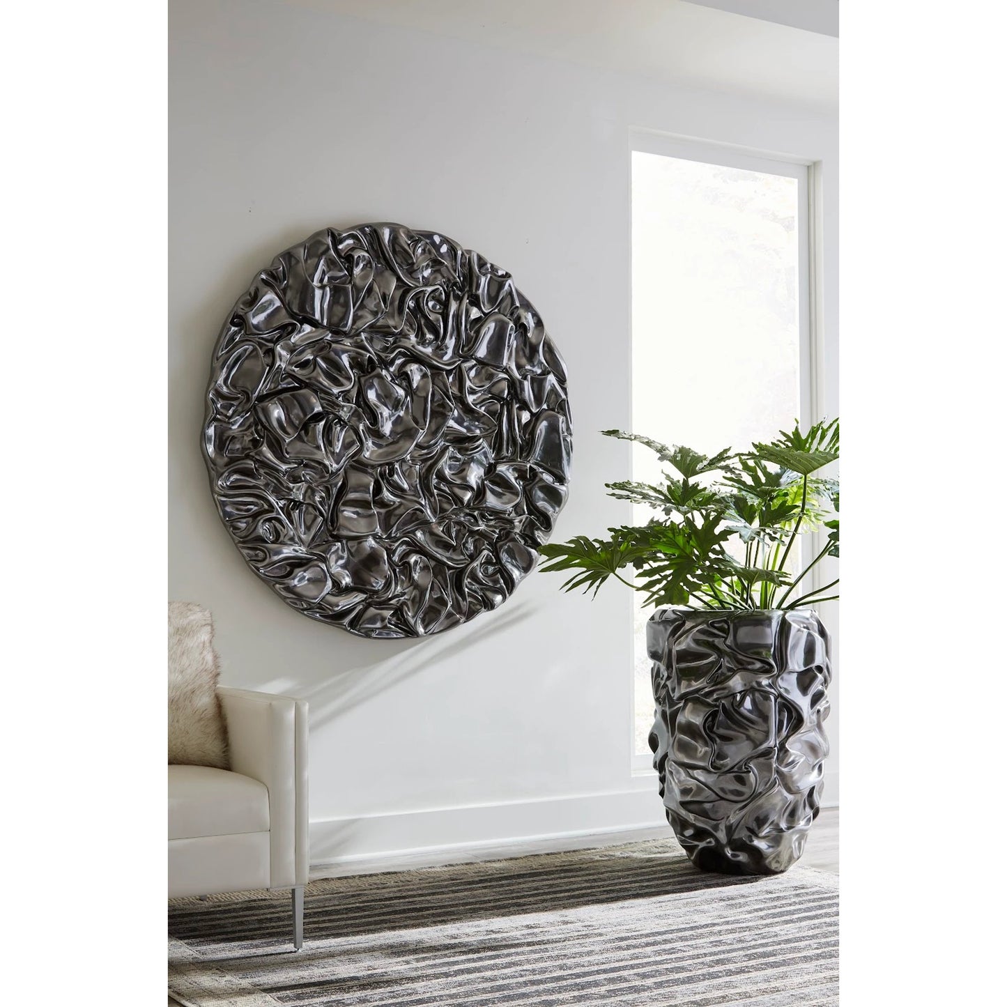 004 SI-1944828 | Lifestyle | Drape Planter, Liquid Silver by Phillips Collection in liquid silver. Made from resin in a modern style.