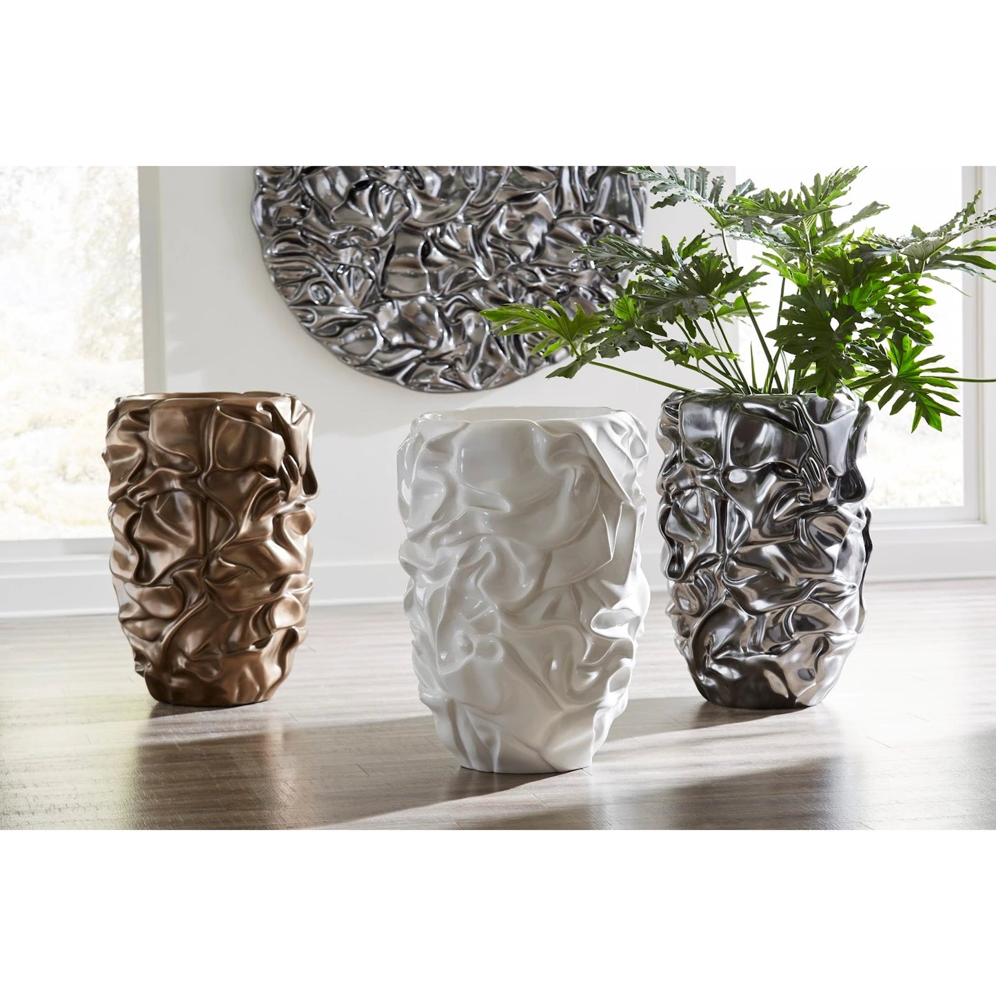 005 SI-1944828 | Lifestyle | Drape Planter, Liquid Silver by Phillips Collection in liquid silver. Made from resin in a modern style.