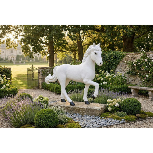 Pony Sculpture C by Phillips Collection in black, white and gel coat. Made from resin in a unique style.