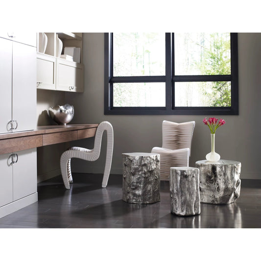 Log Silver Stool by Phillips Collection in silver and silver leaf. Made from resin in a eclectic & global style.