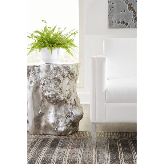 Log Silver Side Table by Phillips Collection in silver and silver leaf. Made from resin in a eclectic & global style.