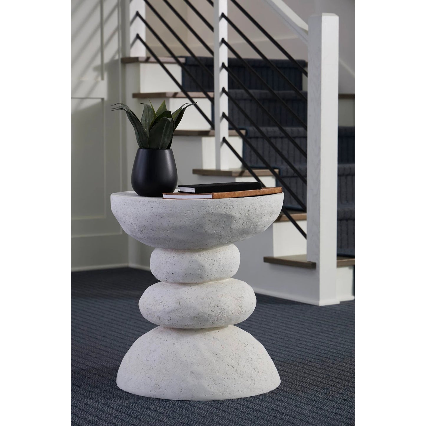 003 SR-939376 | Lifestyle | Boulder Side Table by Phillips Collection in off white and stone cast. Made from resin, stone in a eclectic & global style.