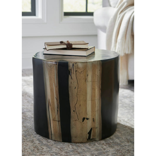 Cast Petrified Brown Round Wood Stool, Resin by Phillips Collection in brown and brown round. Made from resin in a eclectic & global style.