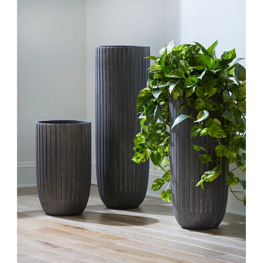 Lourdes Planter by Phillips Collection in gray and stone cast. Made from resin in a modern style.