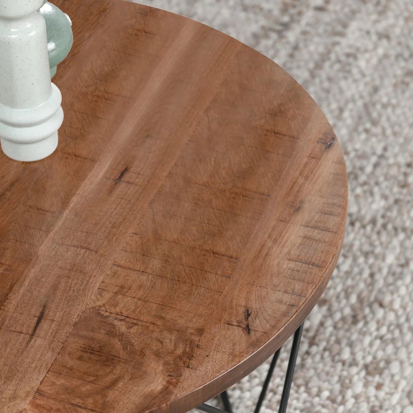 005 SR-897678 | Closeup | Chester Coffee Table by Kosas Home in chestnut brown top, black finish base. Made from mango wood top, iron base in a modern style.
