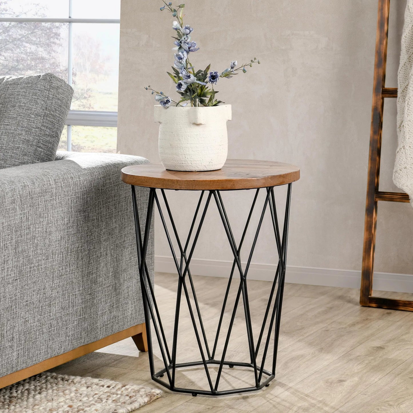 007 SR-897679 | Lifestyle | Chester End Table by Kosas Home in chestnut brown top, black finish base. Made from mango wood top, iron base in a modern style.
