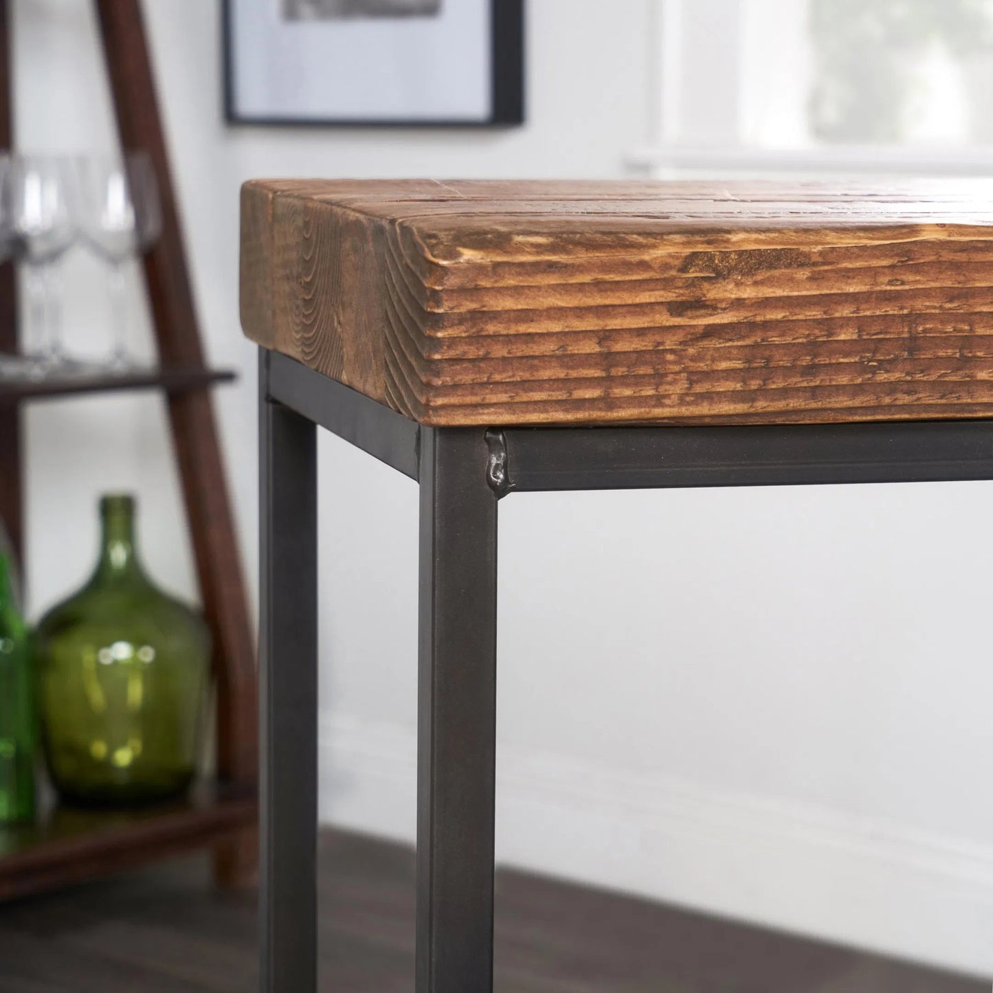 006 SR-897780 | Closeup | Porter Barstool by Kosas Home in rustic mahogany. Made from reclaimed pine top, iron legs in a modern style.
