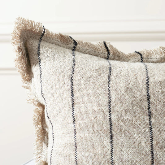 McLeod Pillow by HedgeApple Essentials in natural, black. Made from linen, zipper, 100% virgin quality vacuum packed filler in a modern style.