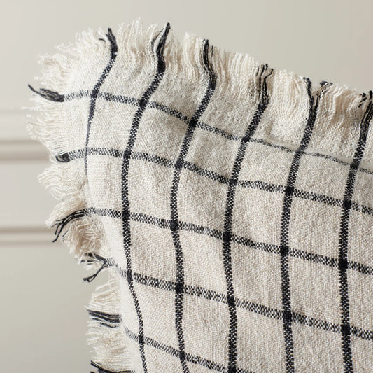 Shackelford Pillow by HedgeApple Essentials in natural, black. Made from linen, zipper, 100% virgin quality vacuum packed filler in a modern style.