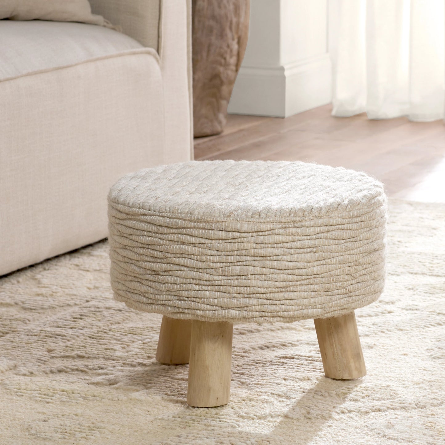 003 SI-2123732 | Lifestyle | Penna Pouf by Jaipur Living in cream, white. Made from 96% wool 4% cotton in a cottage & farmhouse style.