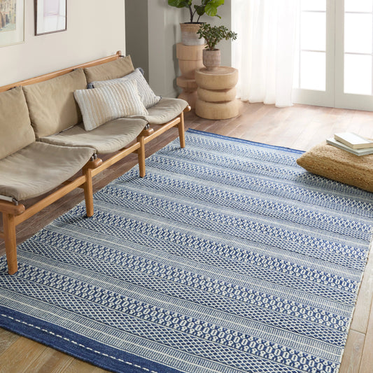 Penrose PNR06 Indoor/Outdoor Rug by Jaipur Living in navy, cream. Made from 100% polyester in a unique style.
