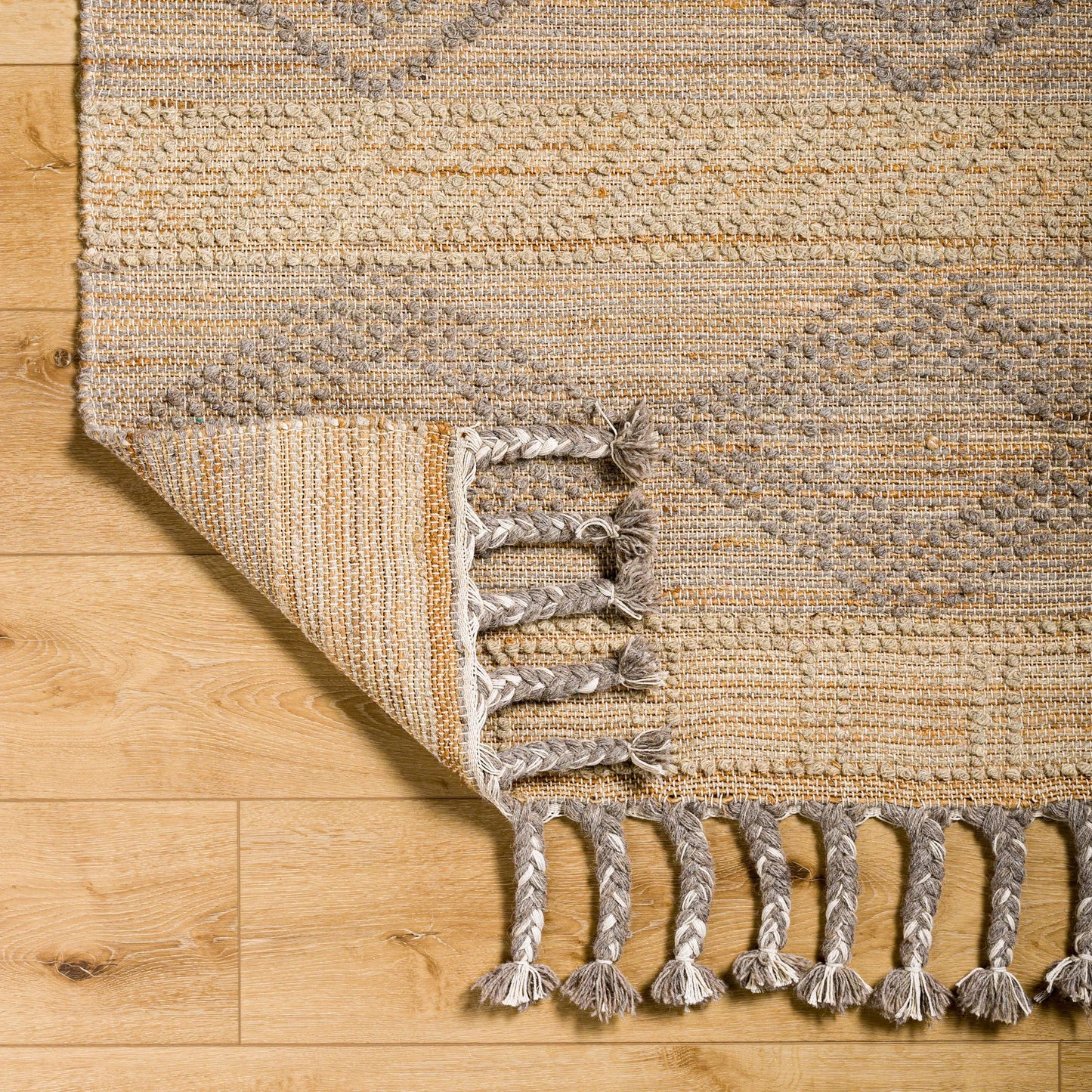 007 SI-1756583,SI-1756584,SI-1756586,SI-1756587,SI-1756588 | Closeup | Preston Rug - 29253 by Surya in tan, medium gray. Made from 50% jute, 50% wool in a unique style.
