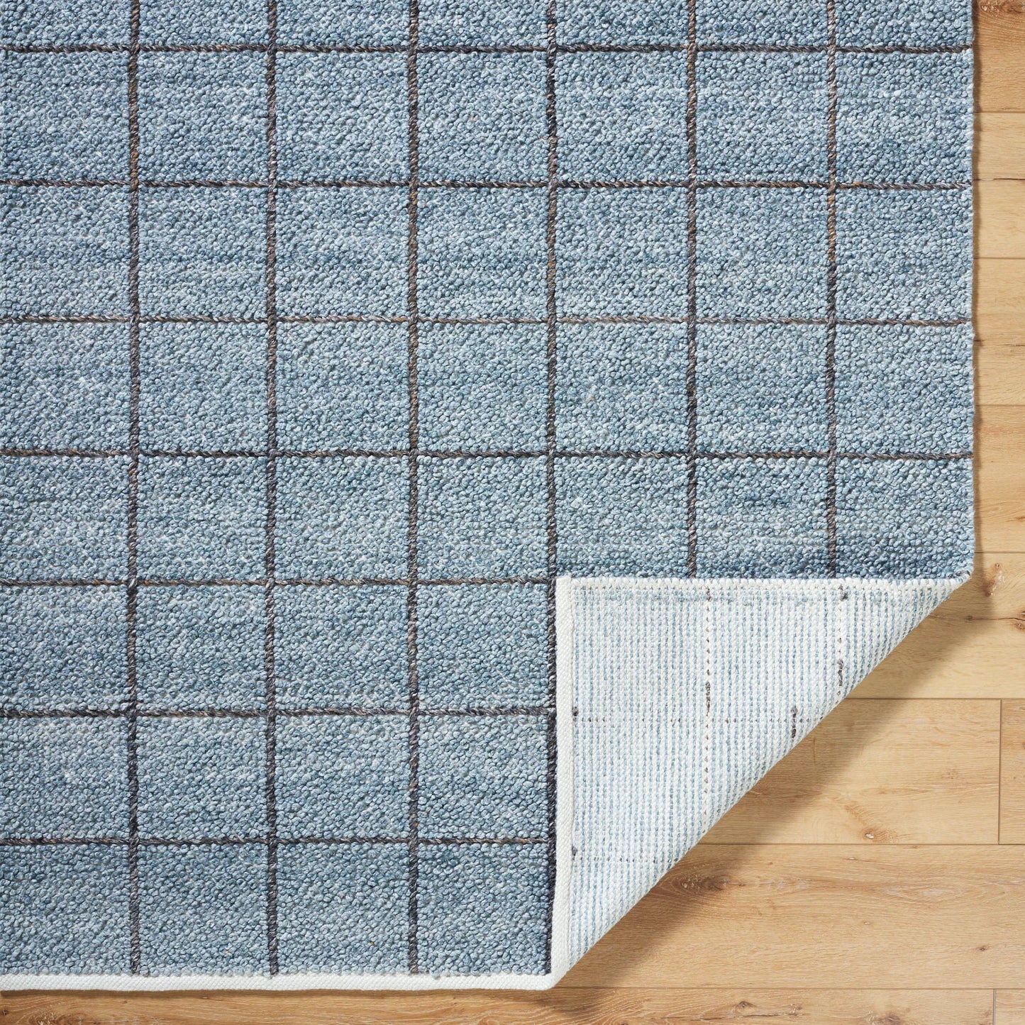004 SI-2167519,SI-2167520,SI-2167521,SI-2167522 | Closeup | Provence Rug - 484419 by Livabliss in slate blue, charcoal, steel grey. Made from recycled pet yarn in a unique style.