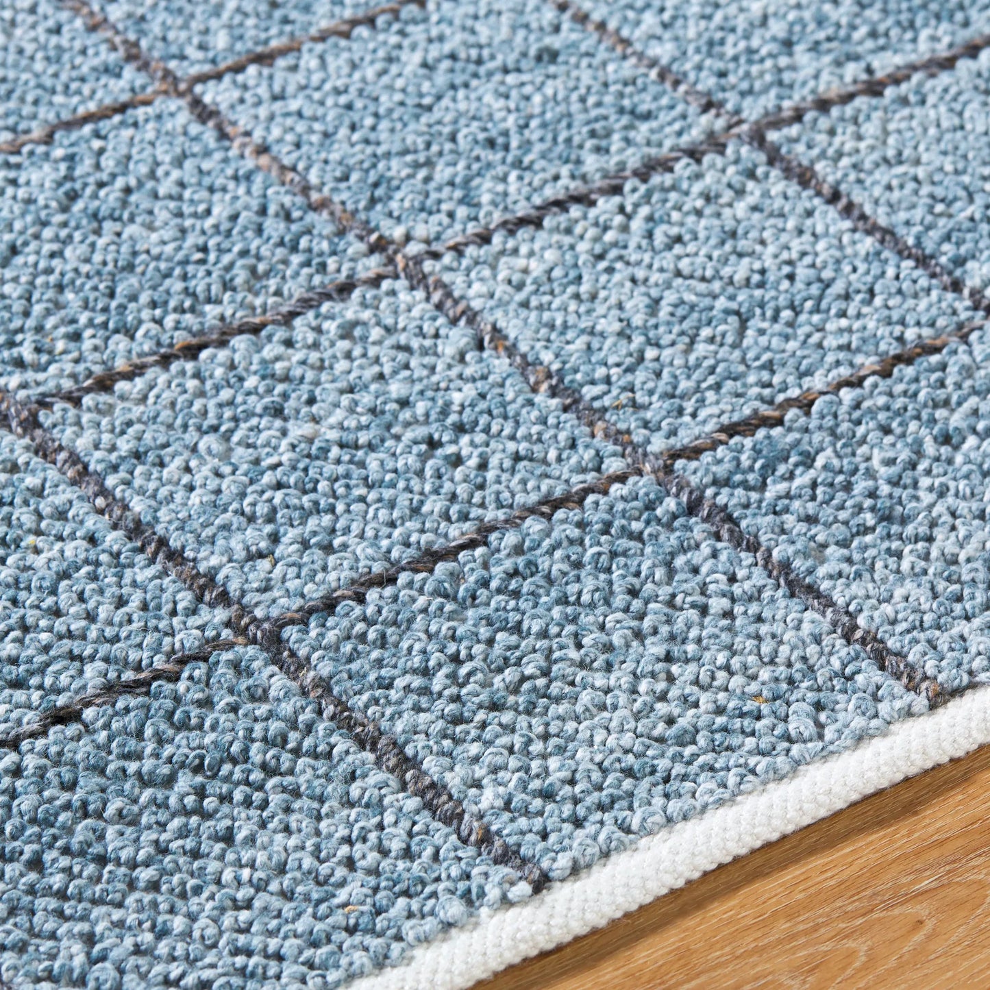 005 SI-2167519,SI-2167520,SI-2167521,SI-2167522 | Closeup | Provence Rug - 484419 by Livabliss in slate blue, charcoal, steel grey. Made from recycled pet yarn in a unique style.