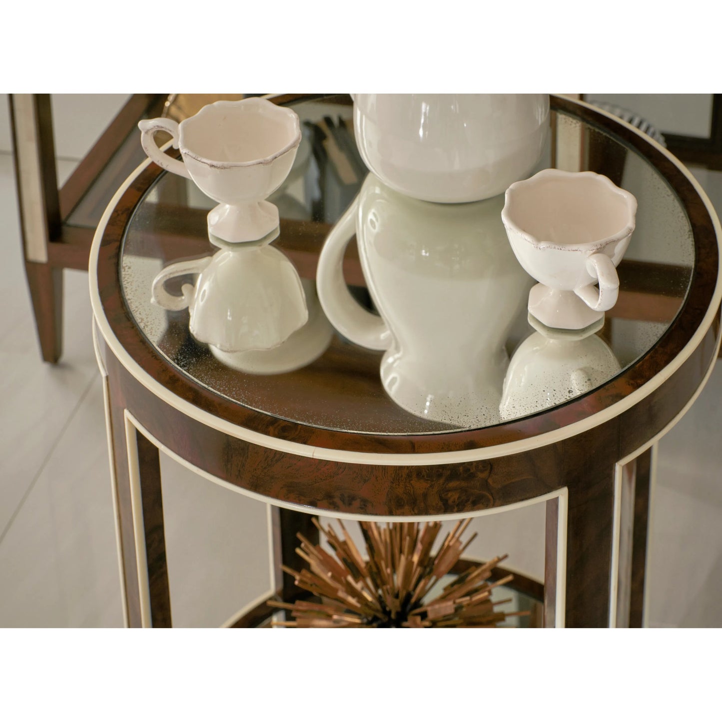012 SI-2186358 | Lifestyle | Jacques Round End Table by Jonathan Charles in brown and medium brown mahogany. Made from mahogany veneers, faux bone, glass in a modern style.