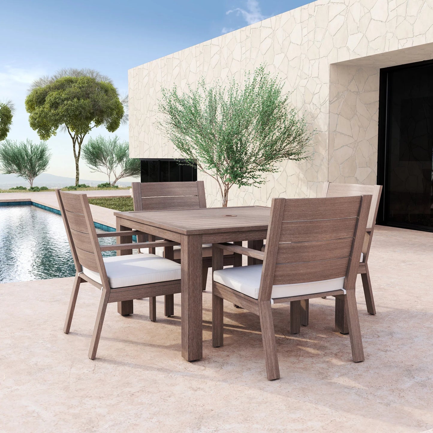 008 SI-2166945 | Lifestyle | Laguna Outdoor Dining Chair by Sunset West in driftwood. Made from aluminum in a modern style.