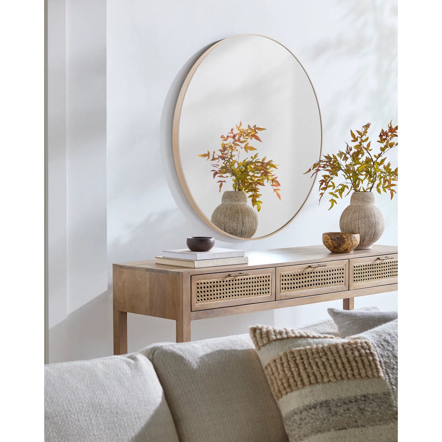 005 SI-2245499,SI-2245500,SI-2245501,SI-2245502 | Lifestyle | Aranya Round Accent Wall Mirror by Livabliss in natural. Made from aluminum in a transitional style.