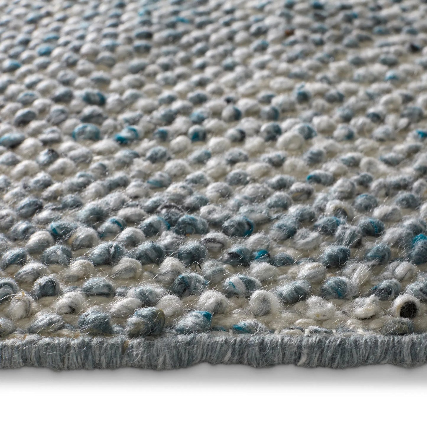 003 SI-2386409,SI-2444796 | Closeup | Rebecca RBC08 Indoor/Outdoor Rug by Jaipur Living in blue, white. Made from 100% pet yarn in a unique style.