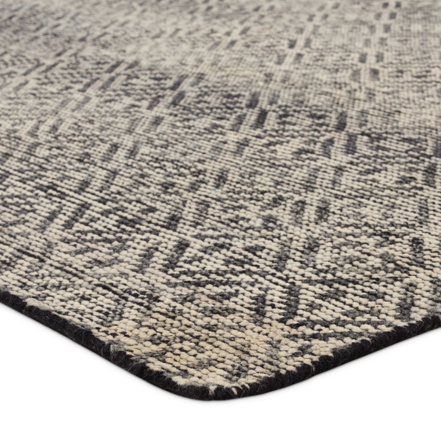 002 SI-2123737,SI-2123738,SI-2123739,SI-2123740 | Closeup | Rize Akello Rug by Jaipur Living in black, cream. Made from 100% wool in a unique style.