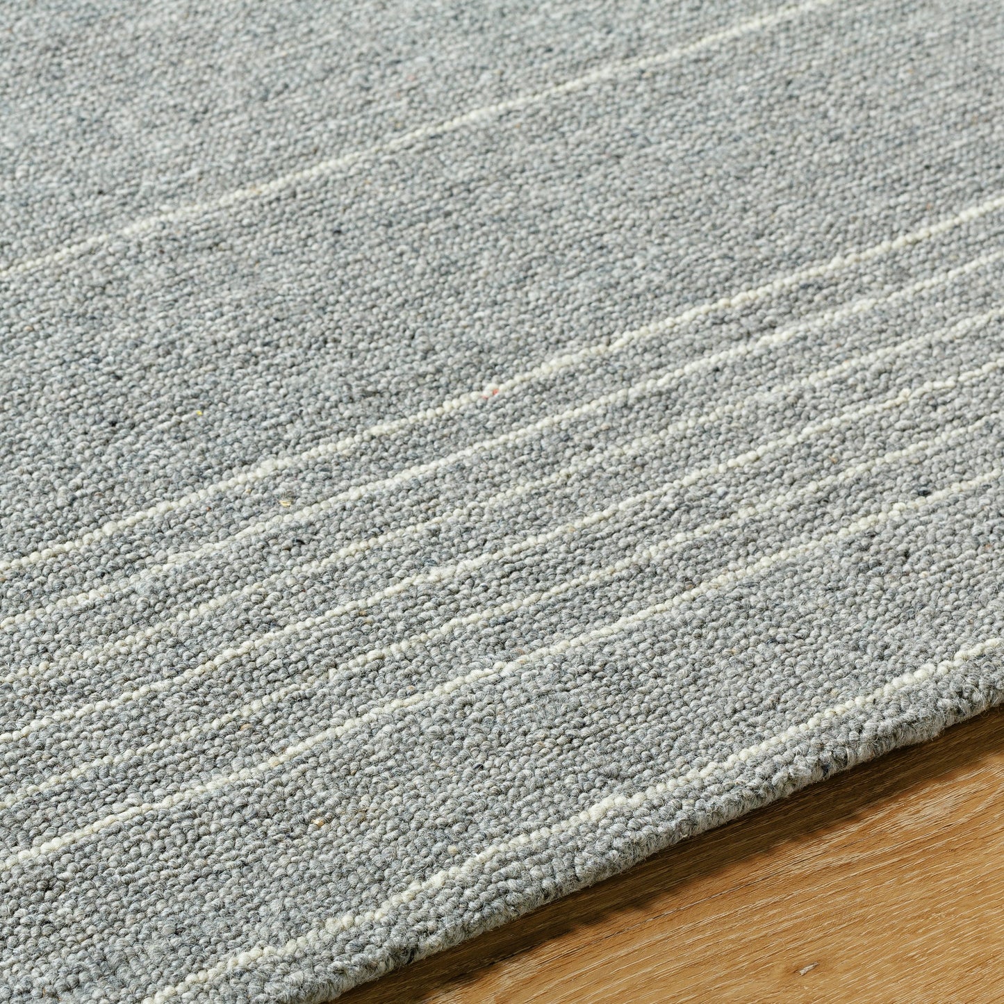 004 SI-2163286,SI-2163287,SI-2163288,SI-2163289 | Closeup | Romano Rug - 484791 by Surya in slate gray, dove gray, ivory. Made from wool in a unique style.