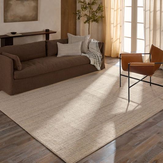 Rene RNE01 Rug by Jaipur Living in tan. Made from 100% wool in a unique style.