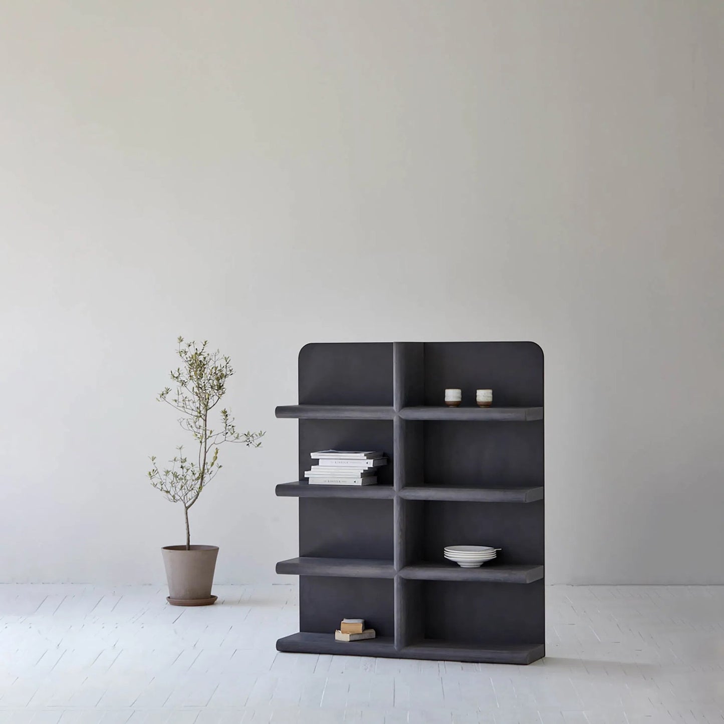 006 SI-2325219 | Lifestyle | Julian Bookcase by LH Imports in black and smoked black. Made from mdf fiber-reinforced concrete, oak wood in a modern style.